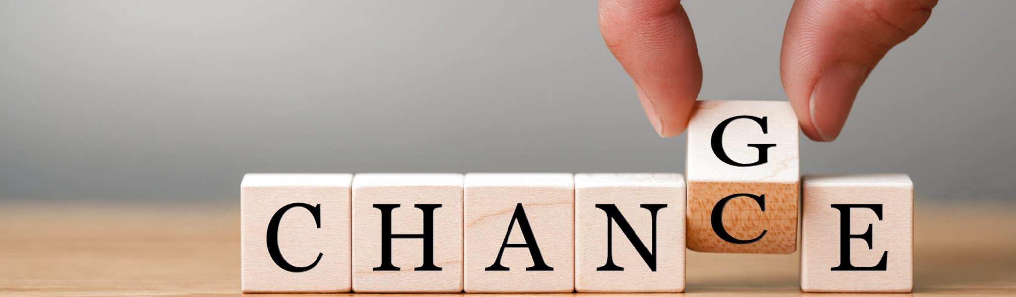 Hand flip wooden cube with word „change“ to „chance“, Personal development and career growth or change yourself concept Hand flip wooden cube with word "change" to "chance", Personal development and career growth or change yourself concept